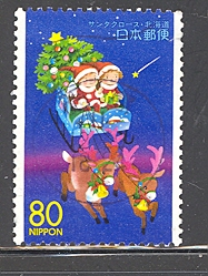 timbre: Le père Noël en traineau - ND bas et gauche