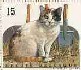 Timbre: Chat assis outils de jardin 