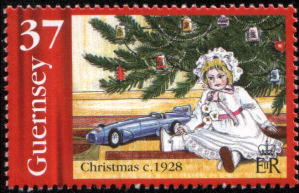 Timbre:  No&euml;l 1928, poup&eacute;e, voiture sous le sapin