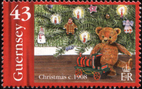Timbre:  No&euml;l 1908, ourson et locomotive sous le sapin