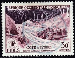 Timbre: Construction route en C&ocirc;te d'Ivoire.