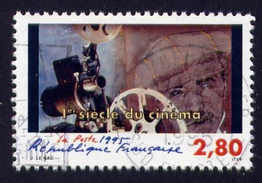 Timbre: 1 si&egrave;cle du cin&eacute;ma - projecteur, t&ecirc;te avec casquette